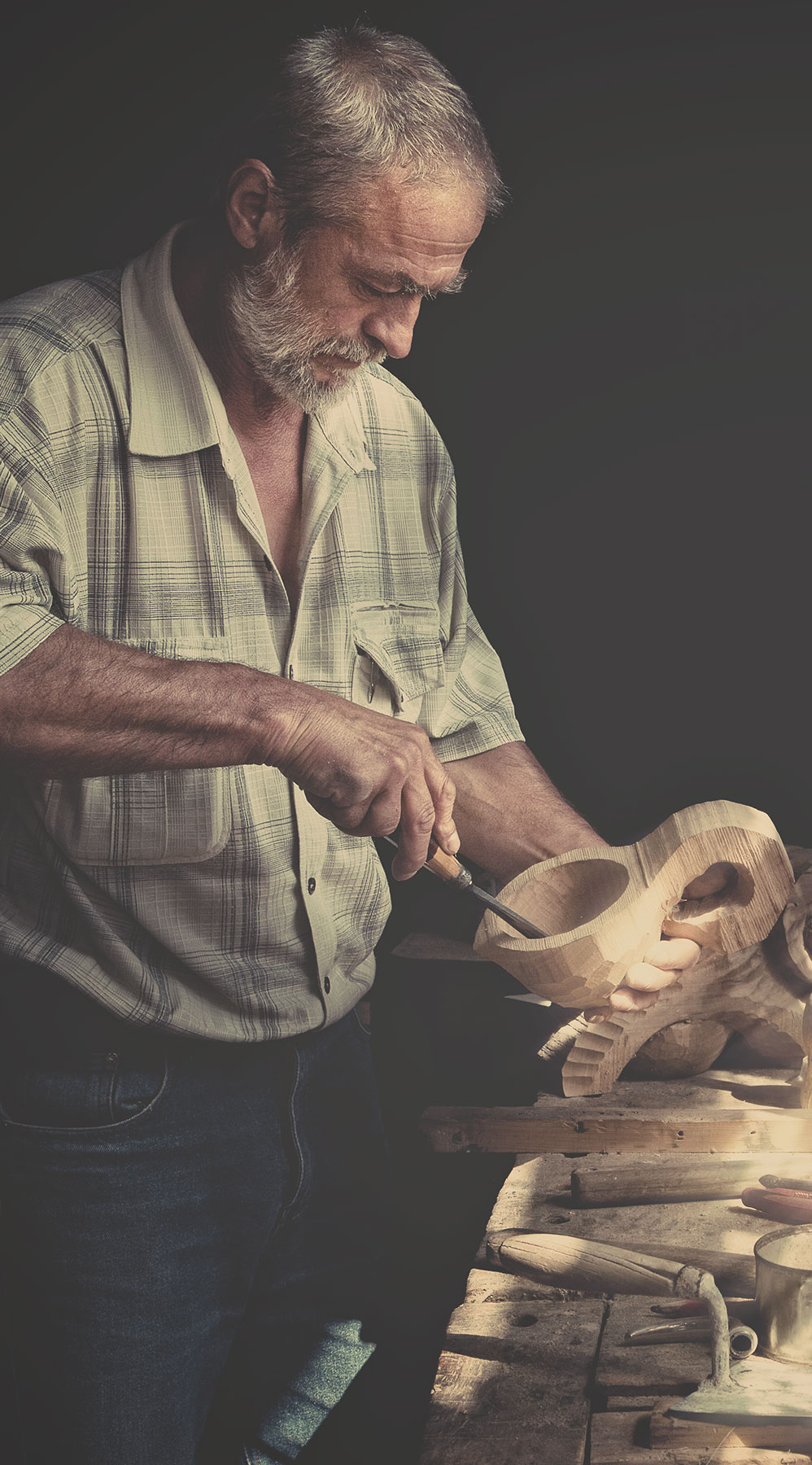 Man carving wood
